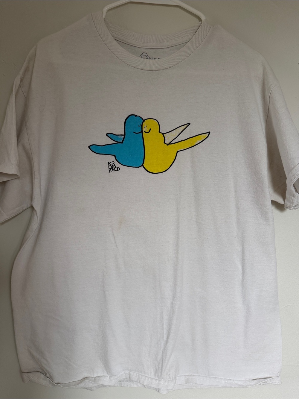 Krooked Skateboarding White Short Sleeve Tee with Blue & Yellow Bird Graphic